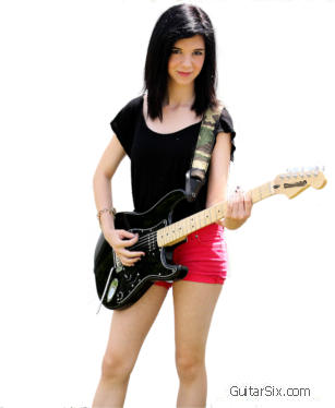 girl holding a guitar